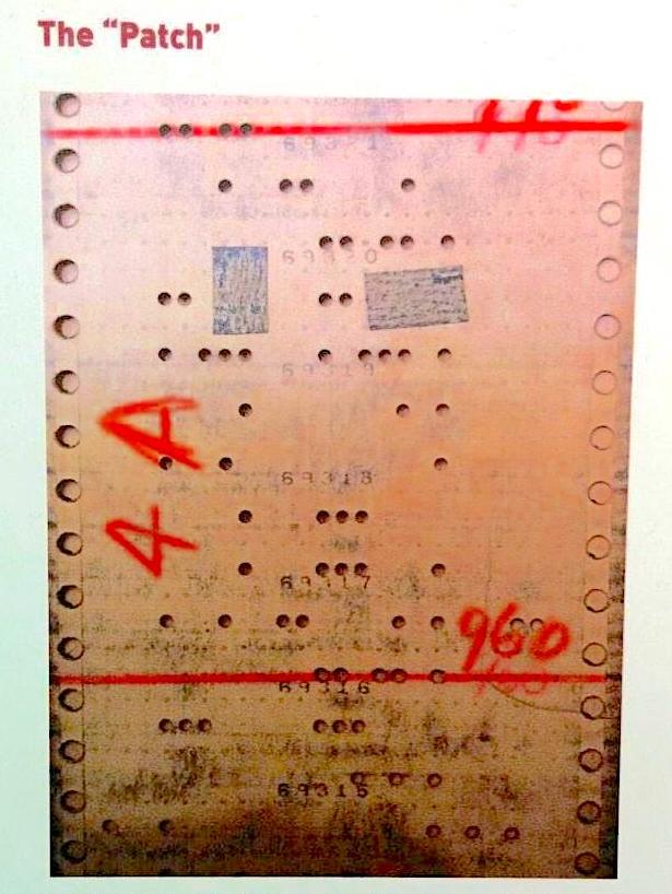 A picture from the Smithsonian Archive Center showing a punch card once used for early computing. Punch cards could be altered by adding tape over holes in the earliest form of patch management.